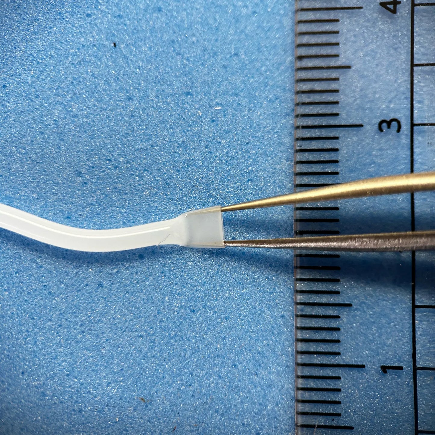 academic model 2mm tweezers handling.